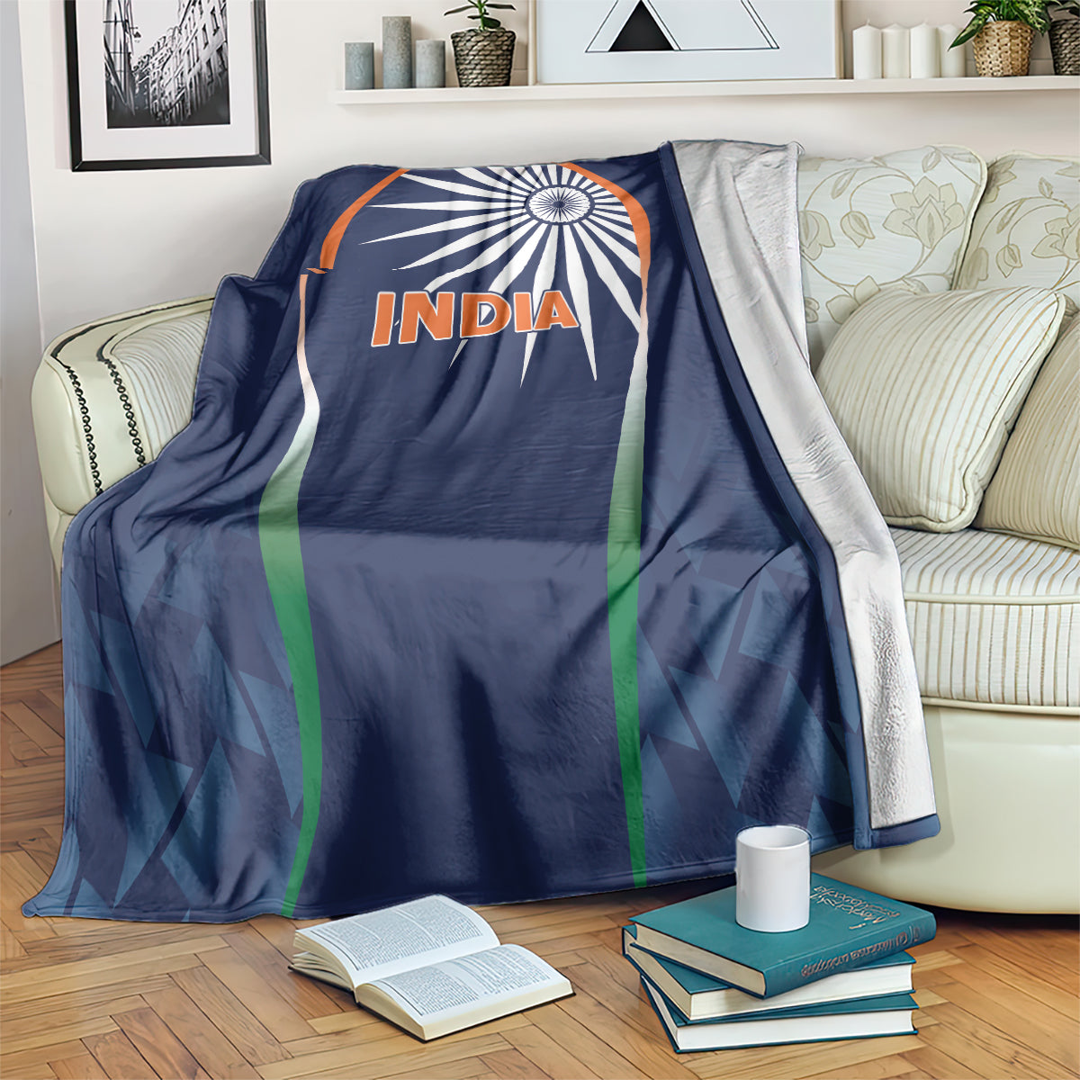 Blue India cricket blanket draped over couch, showing white wheel emblem and “India”