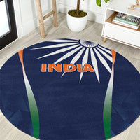 Round blue India cricket rug with central INDIA text and radial starburst design