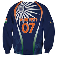 Blue sweatshirt back with circular emblem, 'YOUR TEXT' and orange 07