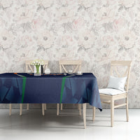 Blue tablecloth on dining set featuring geometric pattern and central India emblem