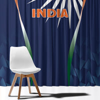 Close view of navy blue curtains with India emblem graphic and INDIA lettering at top