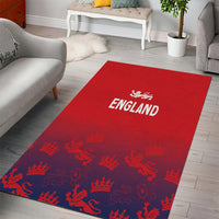 Red borderless area rug with 'ENGLAND' wordmark and navy-blue motif all over