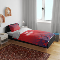 Red England duvet cover on bed with two red pillowcases, crowned lion print