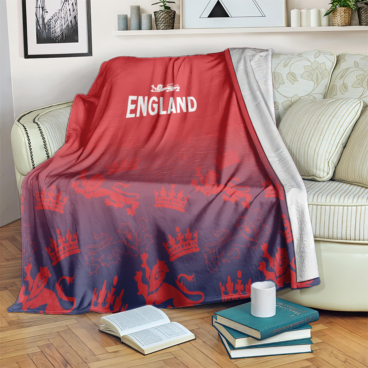 Red England blanket draped on couch, white England logo with crown-and-lion print