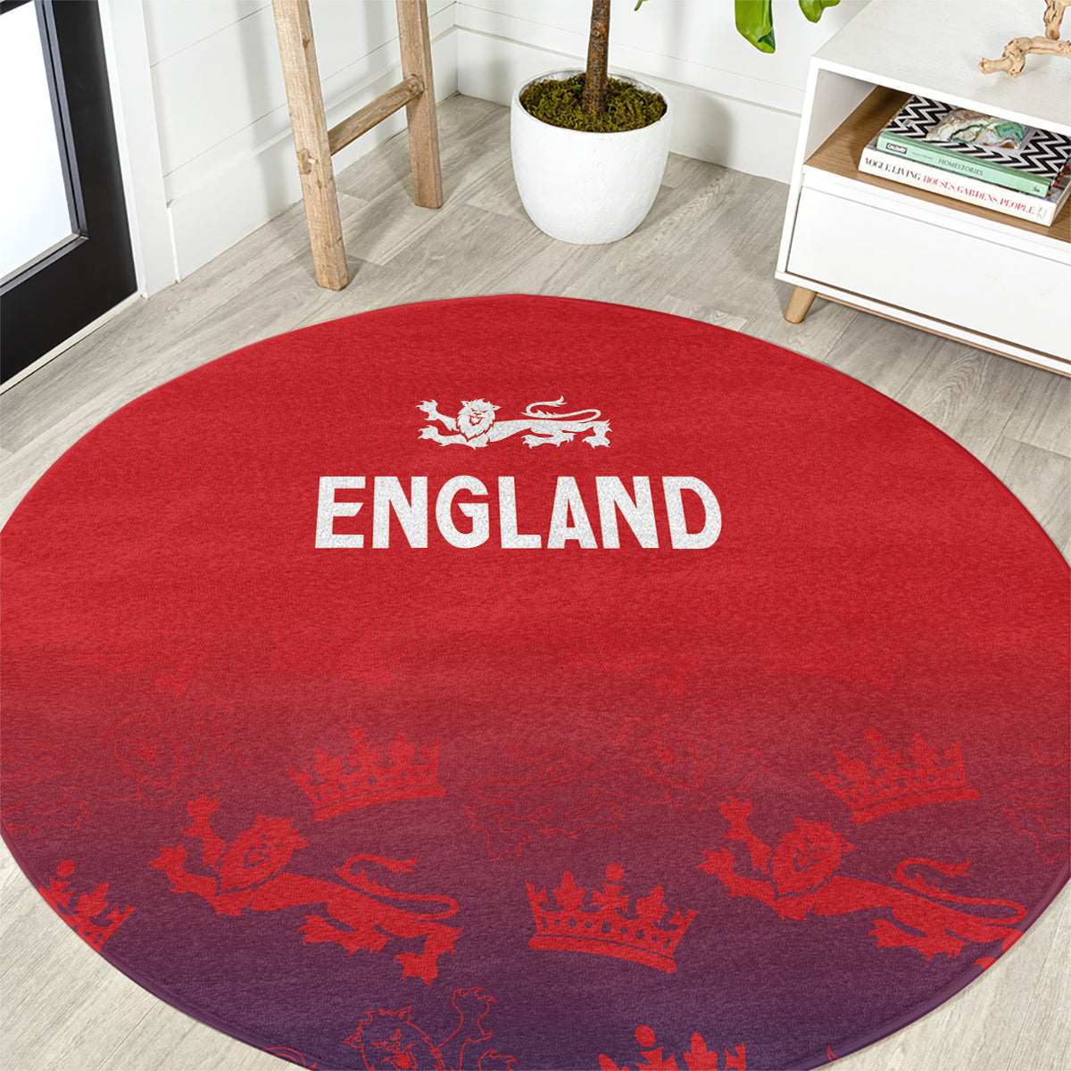 Red round England cricket carpet with white ENGLAND text and lion crest at center