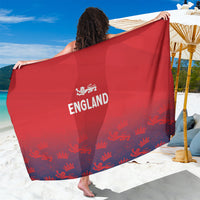 Red England cricket sarong with seamless design and crest logo, bordered pattern