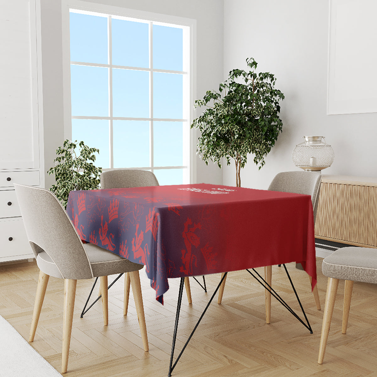 Red and navy patterned tablecloth draping over dining table, full coverage.