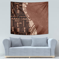 Brown tribal tapestry with geometric border and leaf-like pattern on the right side.