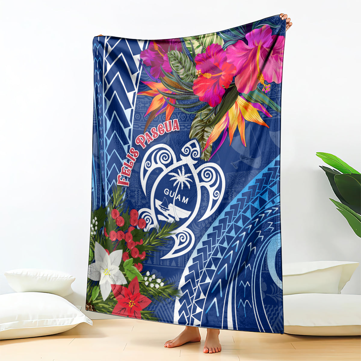 Blue Guam Christmas blanket with floral and tribal wave pattern, red and pink blossoms