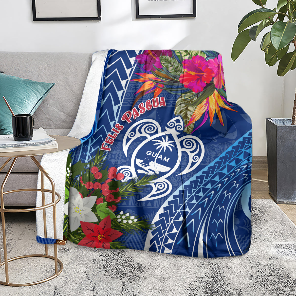 Blue Guam Christmas blanket covering a chair, with floral border and Guam crest center