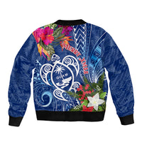 Blue bomber jacket with tropical floral graphic on back and Guam emblem; ribbed cuffs