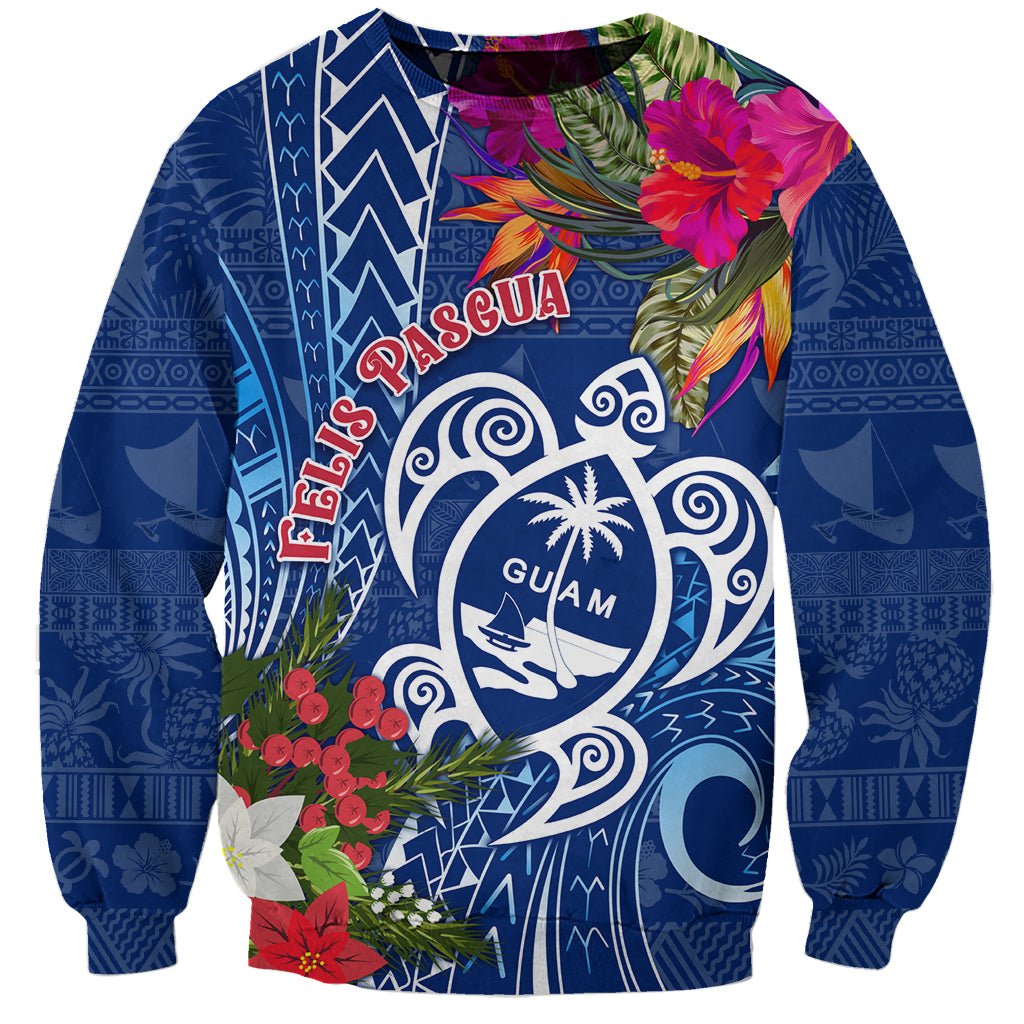 Unisex blue Christmas sweatshirt with Guam emblem, tropical flowers, and tapa pattern