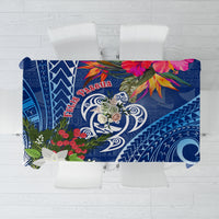 Blue Christmas tablecloth with turtle and tapa-style multicolor pattern