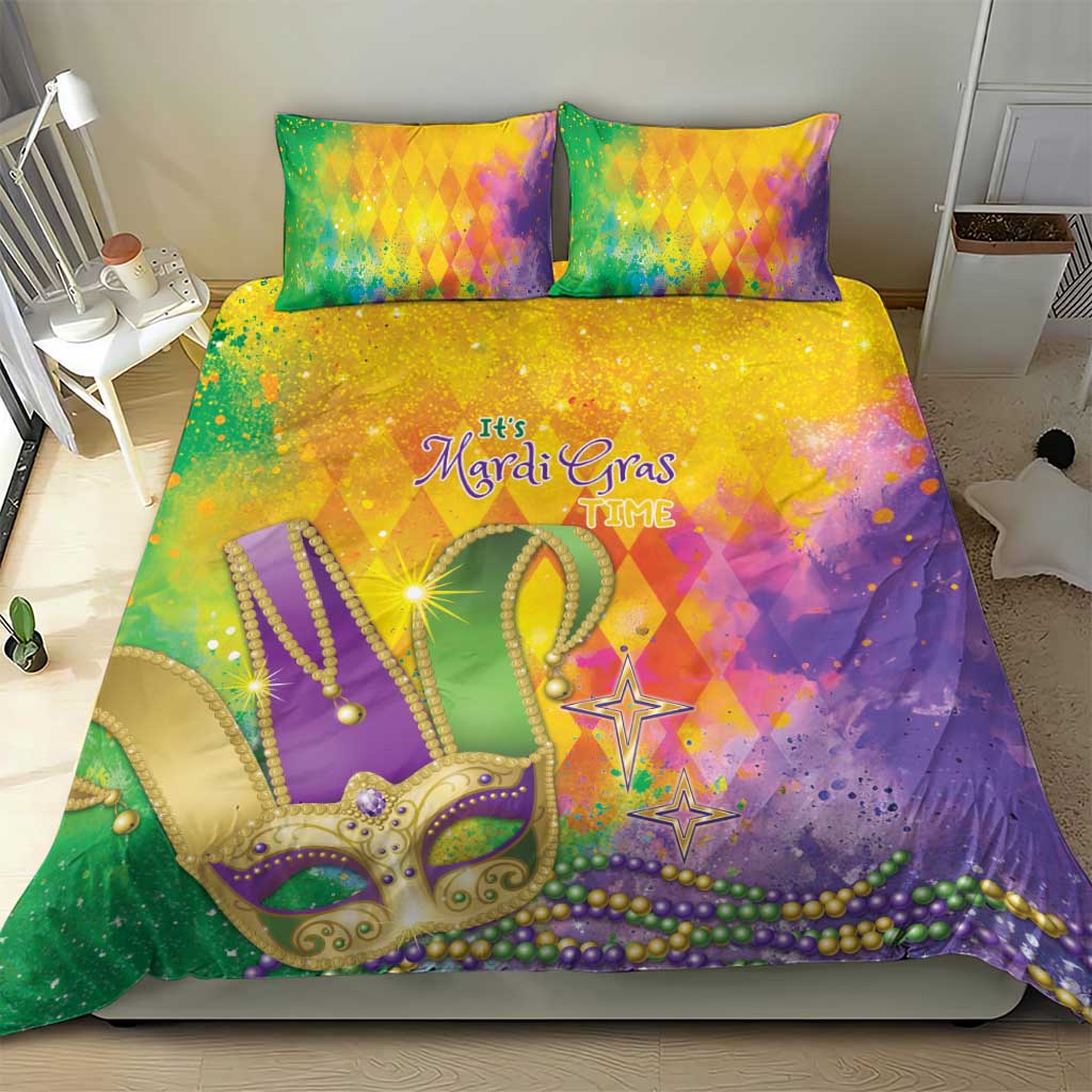 Colorful Mardi Gras bedding set with watercolor mask and star accents; two pillowcases