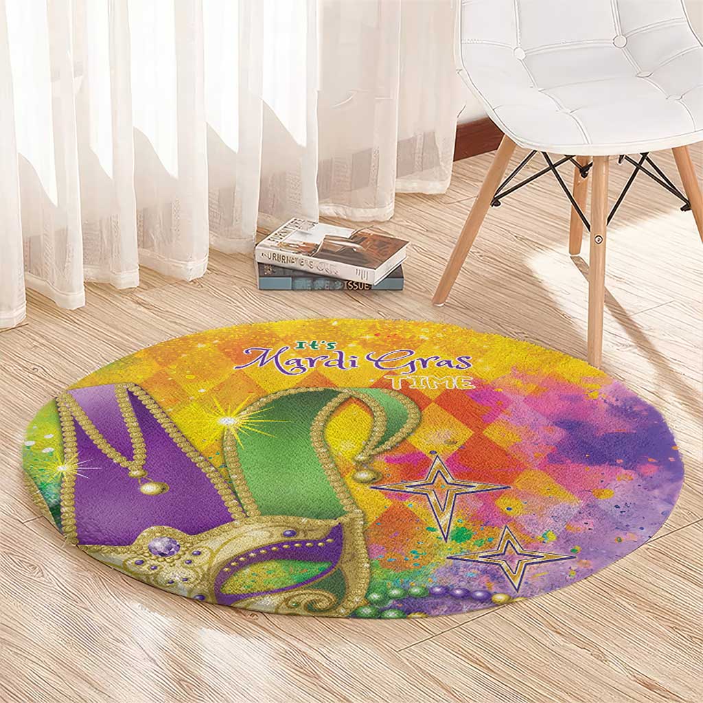 Round Mardi Gras watercolor rug with beads, ornate green crown, stars, and “It’s Mardi Gras Time”