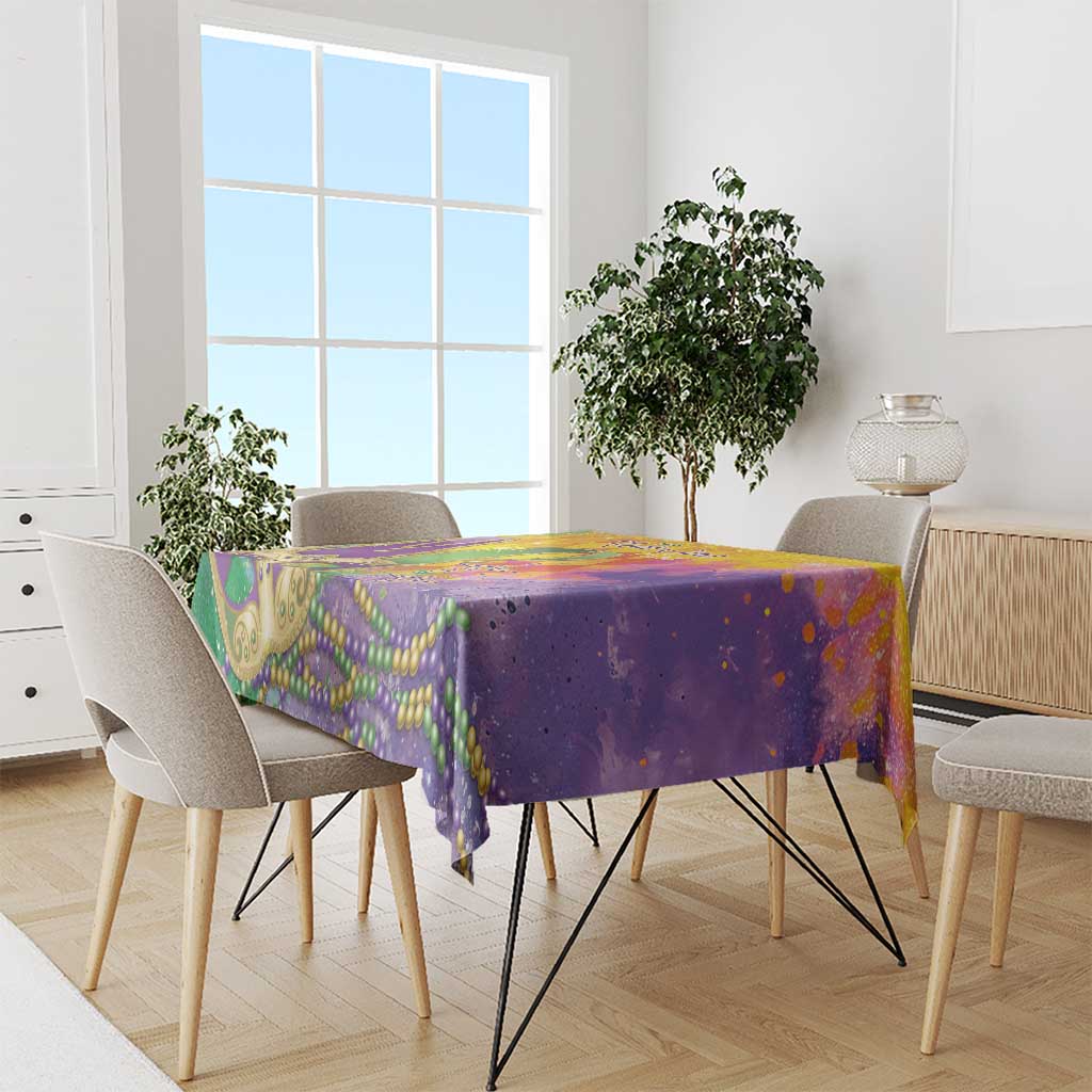 Mardi Gras tablecloth with purple and green watercolor pattern and gold Mardi Gras-style accents