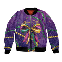 Purple satin bomber jacket with Mardi Gras bow and glitter motifs, black ribbed cuffs