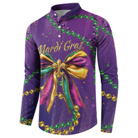 Purple button sweatshirt with Mardi Gras script, large gold bow and green bead garlands