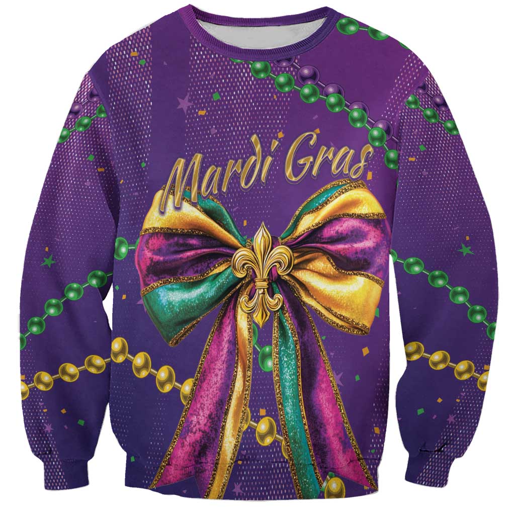 Purple sweatshirt with glitter Mardi Gras bow graphic, green and gold beaded accents