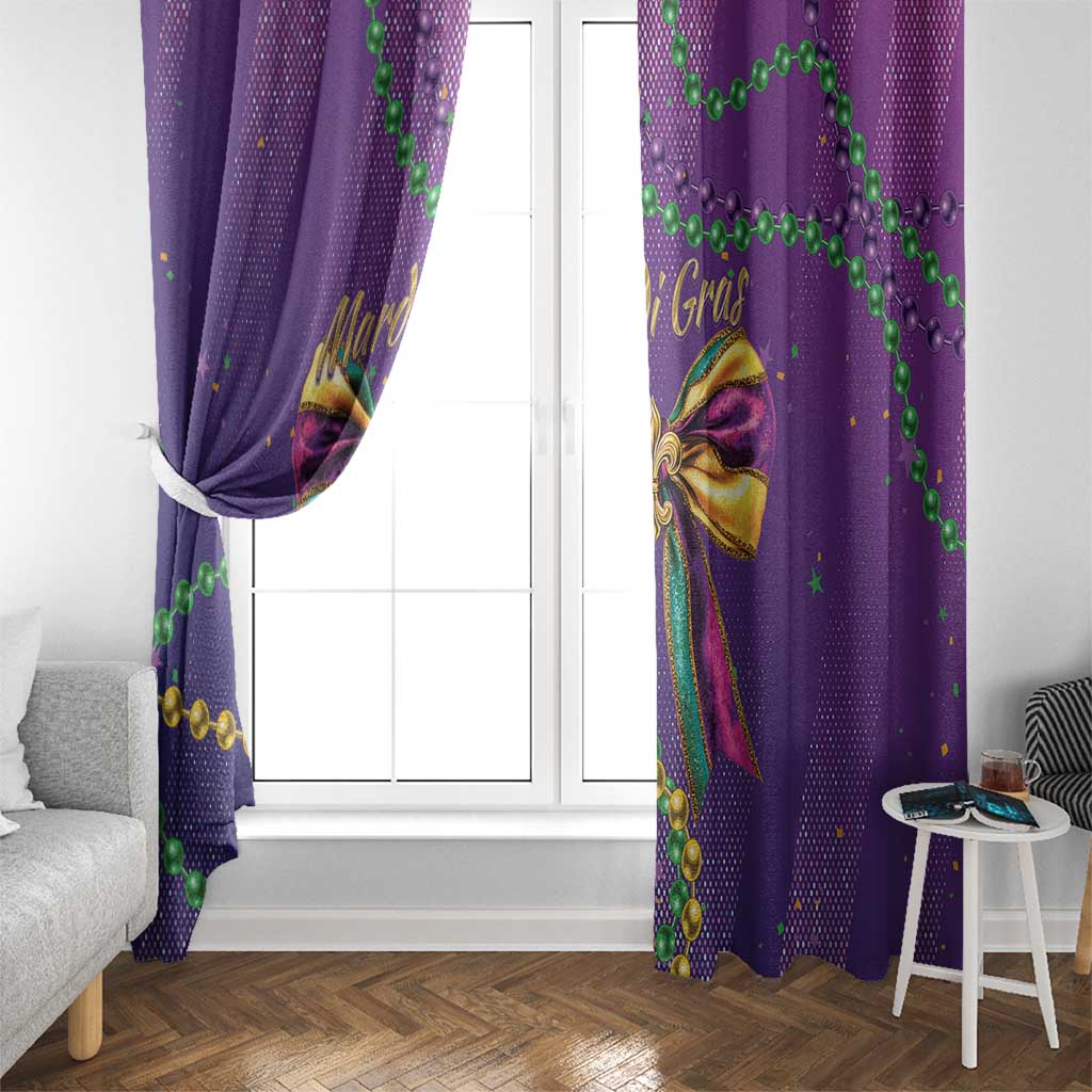 Purple window curtains with bow print, green bead garland, and small star-like glitter spots