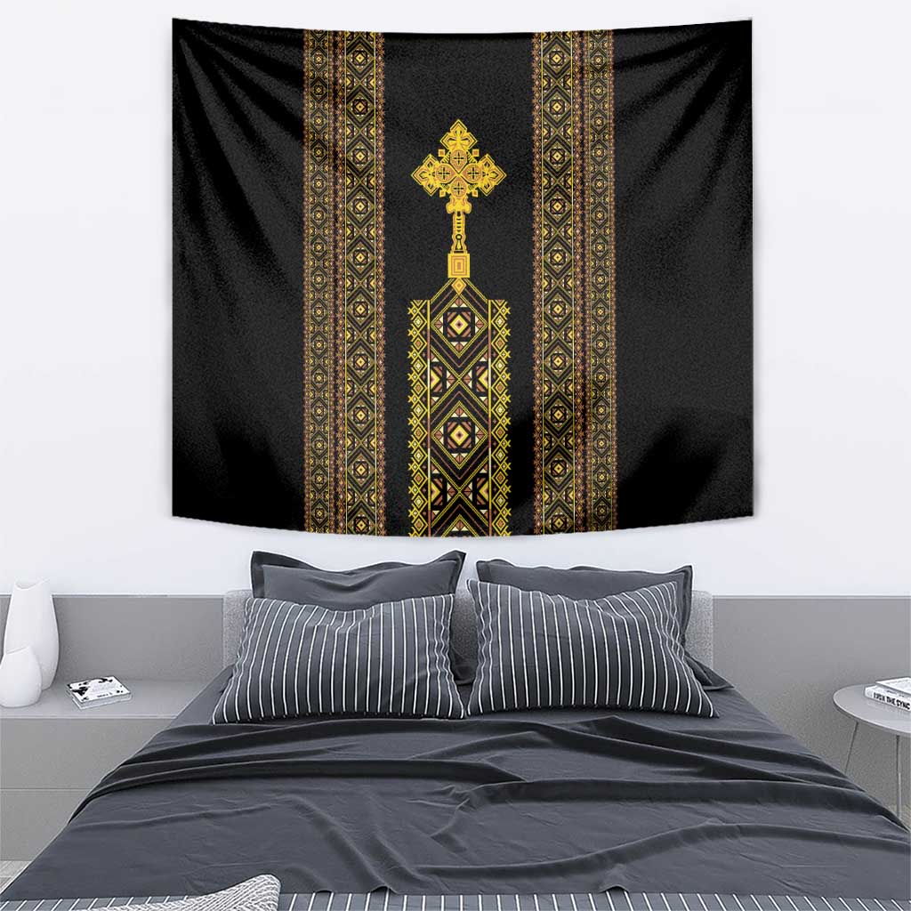 Black wall tapestry featuring gold vertical bands and central cross-like symbol.