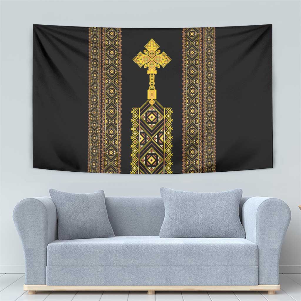 Black hanging tapestry with gold vertical ornamental bands and central emblem cross.
