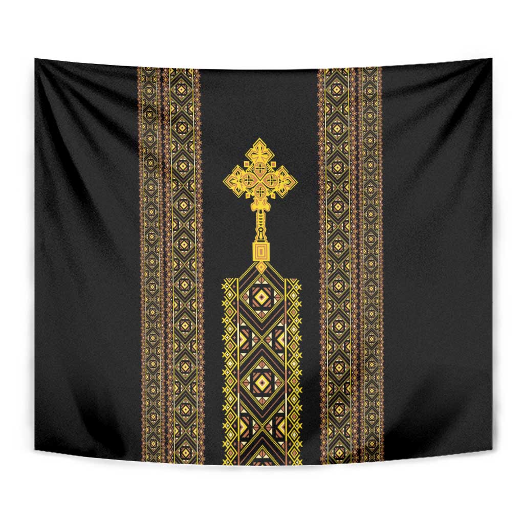 Black tapestry close-up with gold center cross and patterned vertical bands.