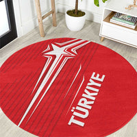 Red round rug with white crescent stars and TURKIYE text