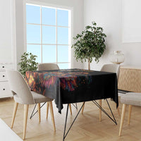Black Dia de los Muertos tablecloth on dining table with vivid colorful scene artwork