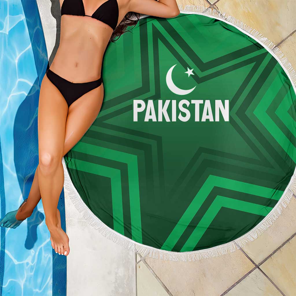 Green round beach blanket with Pakistan text and crescent-star logo, white fringe trim