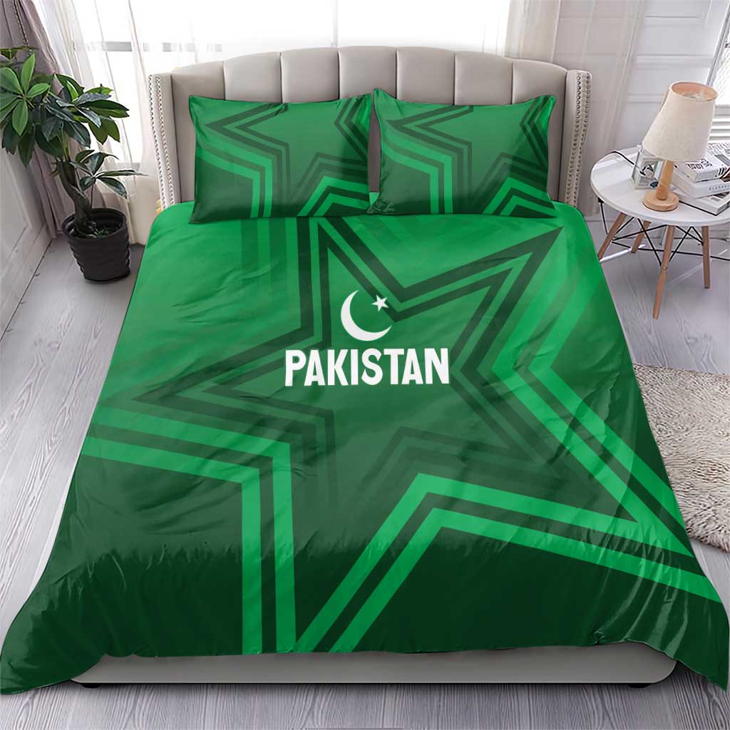 Green bedding set with Pakistan logo, crescent star, and geometric stripe pattern