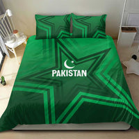 Green bedding set with Pakistan text and crescent-star emblem, geometric pattern on duvet