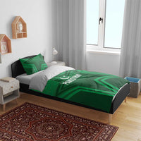 Green bedding set with Pakistan crescent-star emblem and geometric pattern on comforter
