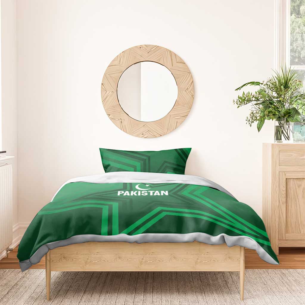 Green bedding set with Pakistan logo and crescent star, geometric pattern on duvet and pillows