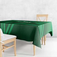 Green geometric Pakistan tablecloth draped over table, folded corner