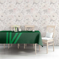 Green Pakistan tablecloth with geometric stripe design on dining table surface