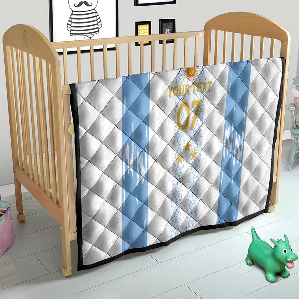 Quilt for a crib: white with light-blue stripes, crest and stars, “YOUR TEXT 07”.