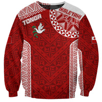 Red patterned rugby sweatshirt with chest logo and bold geometric design