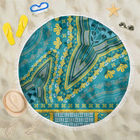 Round teal dashiki beach blanket with yellow floral geometric print and white fringe