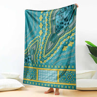 Teal decorative throw blanket with yellow dashiki motifs and central striped panel