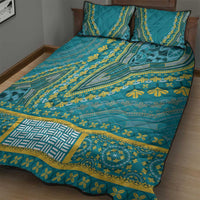 Teal patterned quilt with yellow dashiki border and matching pillowcases