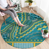 Round teal tribal-pattern carpet with yellow leaf and arch details, wide decorative border