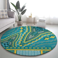Round teal carpet featuring yellow tribal medallion and curved leaf patterns, circular border