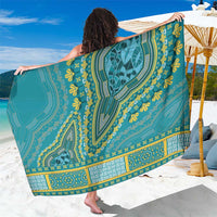 Teal dashiki-style sarong with ornate green and yellow banded pattern, draped wide
