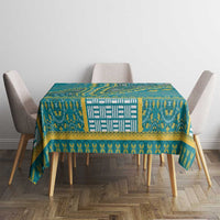 Teal dashiki tablecloth with central geometric panel and wide patterned border
