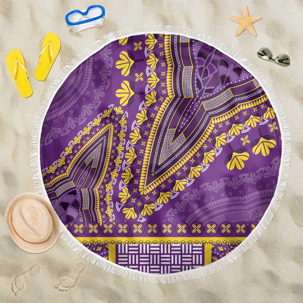 Purple round beach blanket with white fringe and yellow dashiki pattern