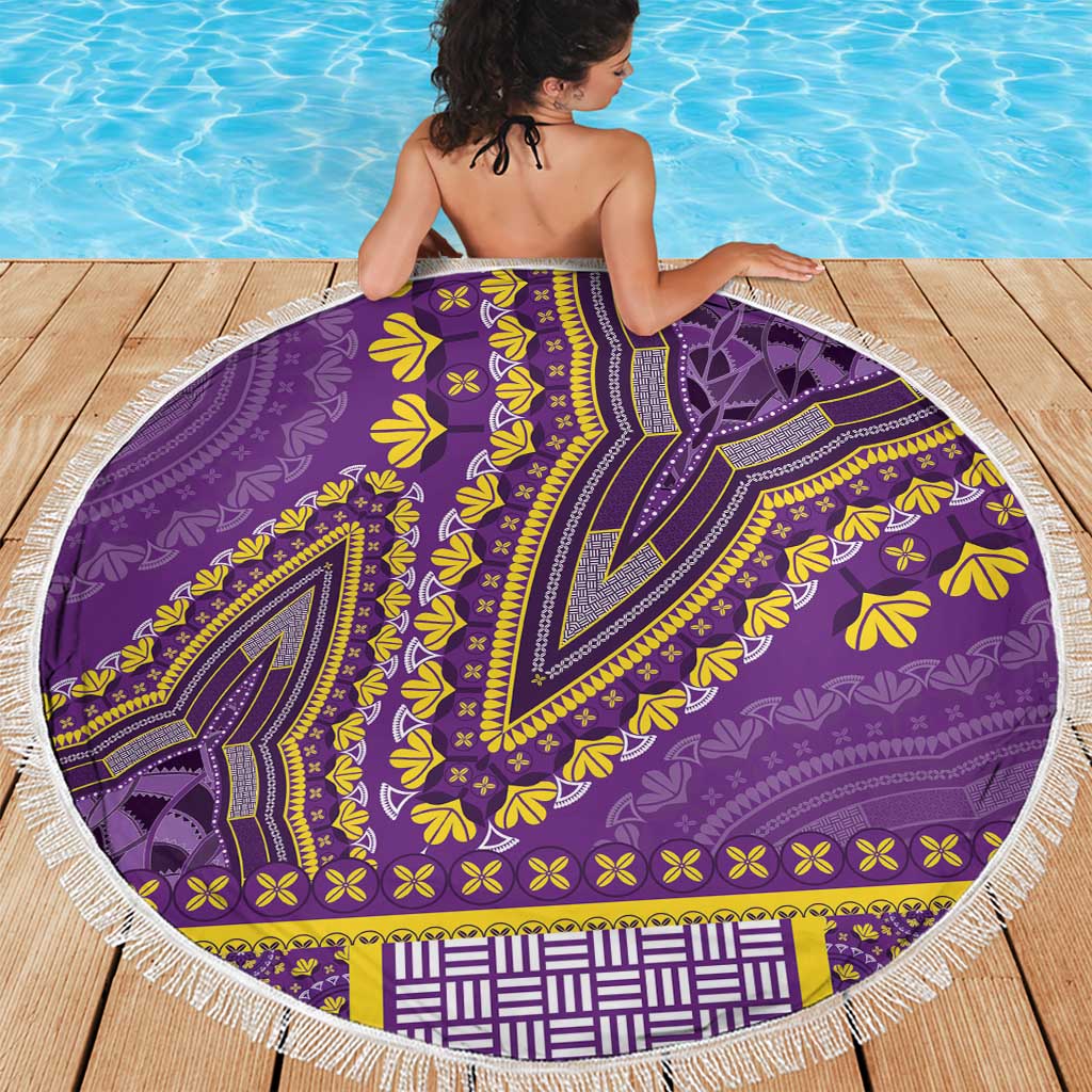 Purple round beach blanket with white fringe and yellow dashiki motifs, full view