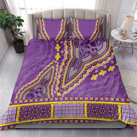 Purple dashiki bedding set with bold yellow motif and matching pillow shams on bed