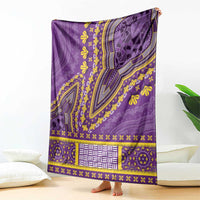 Purple dashiki blanket draped, showing large central patterned medallion and trim