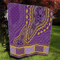 Purple quilt blanket with yellow dashiki band, central swirl medallion, and border trim